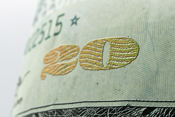 color-shifting ink on the 2003-preesnt issue of the 20 dollar bill