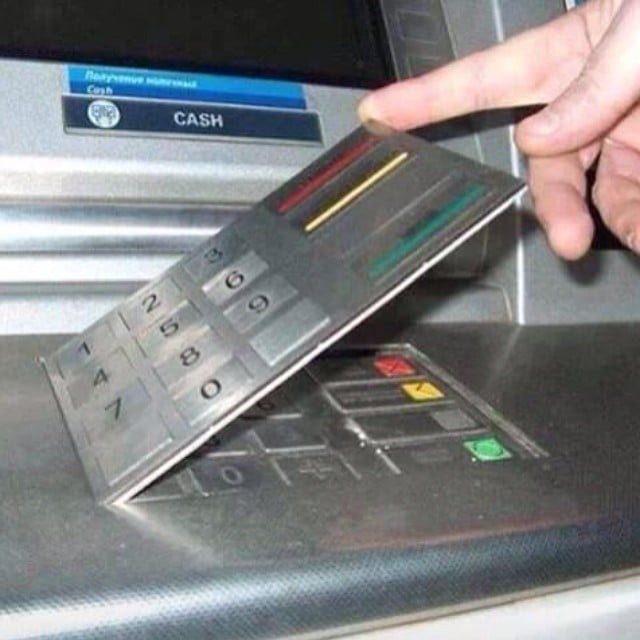 ATM skimmer with a keypad overlay